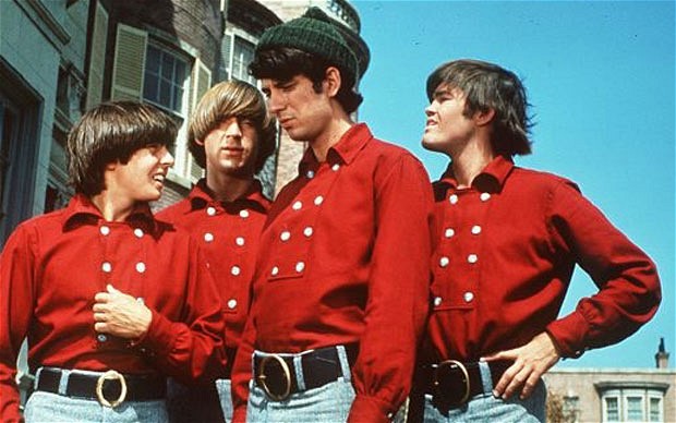 The Monkees in their red shirts